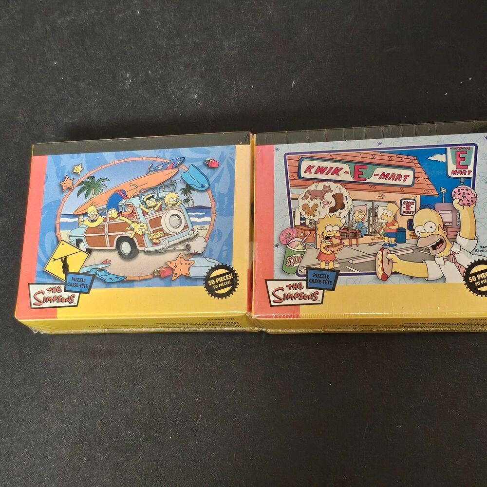 NIB Simpsons Lot of 2 Puzzles 50-Pc Dinner w Dad Kwik E Mart Surfari 2007